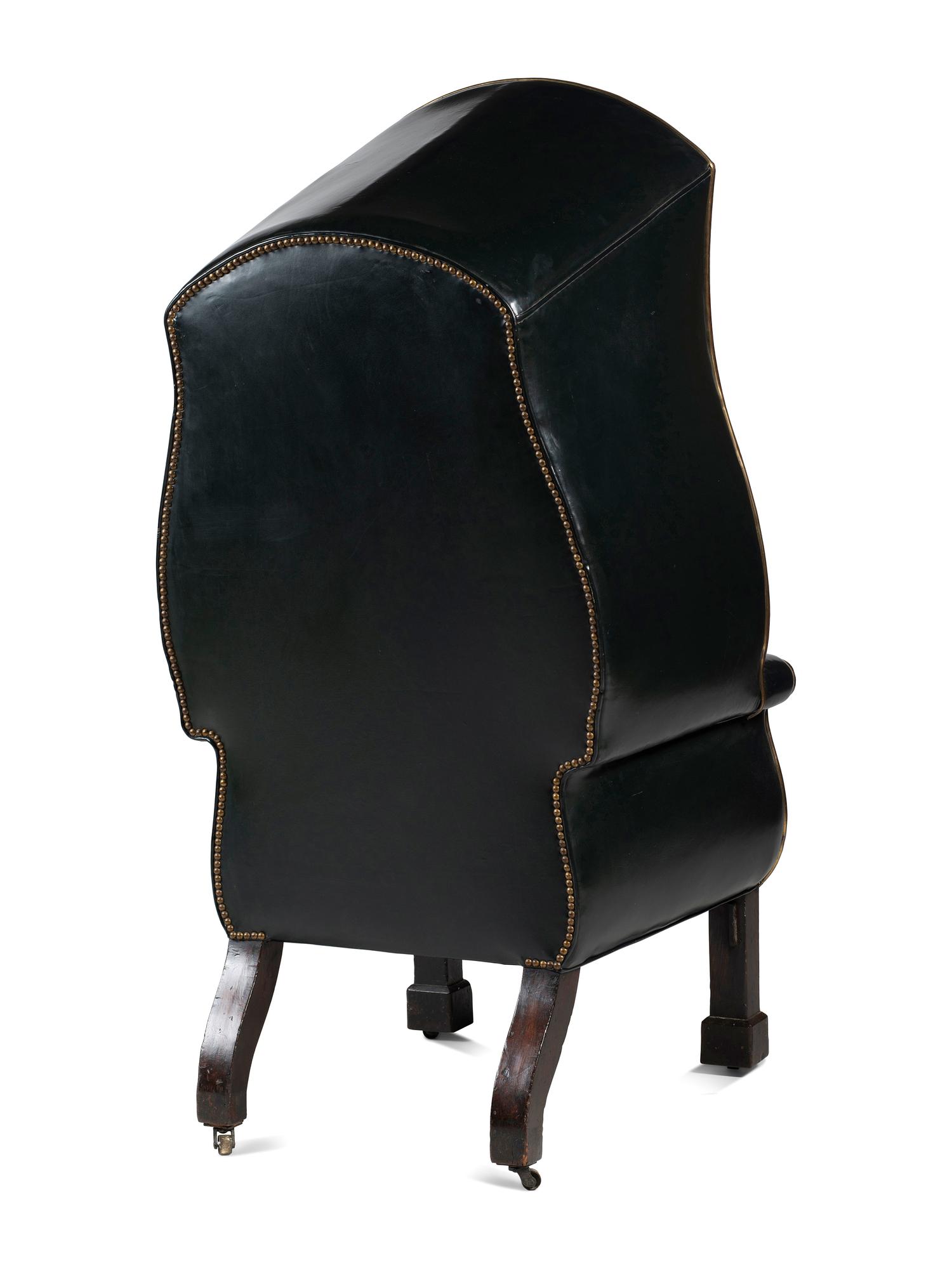 An Irish George III Brass Mounted, Carved Oak, Leather Upholstered Porter's Chair