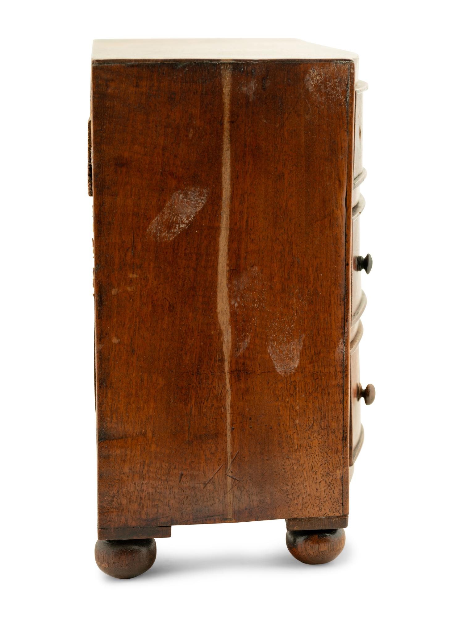 A Regency Mahogany Diminutive Bowfront Chest of Drawers