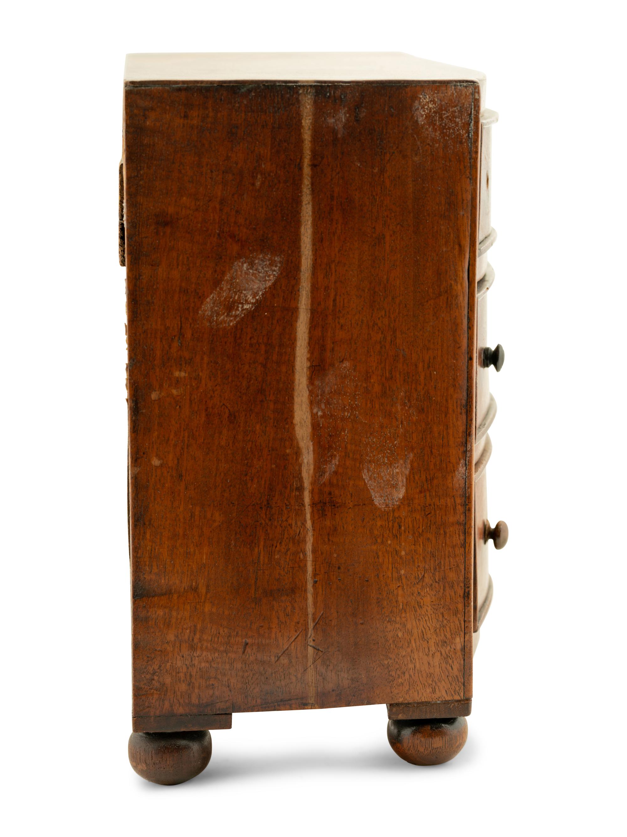 A Regency Mahogany Diminutive Bowfront Chest of Drawers