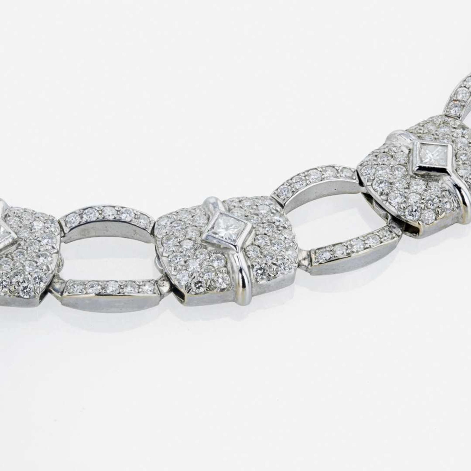 An 18K, white gold and diamond necklace Carelle