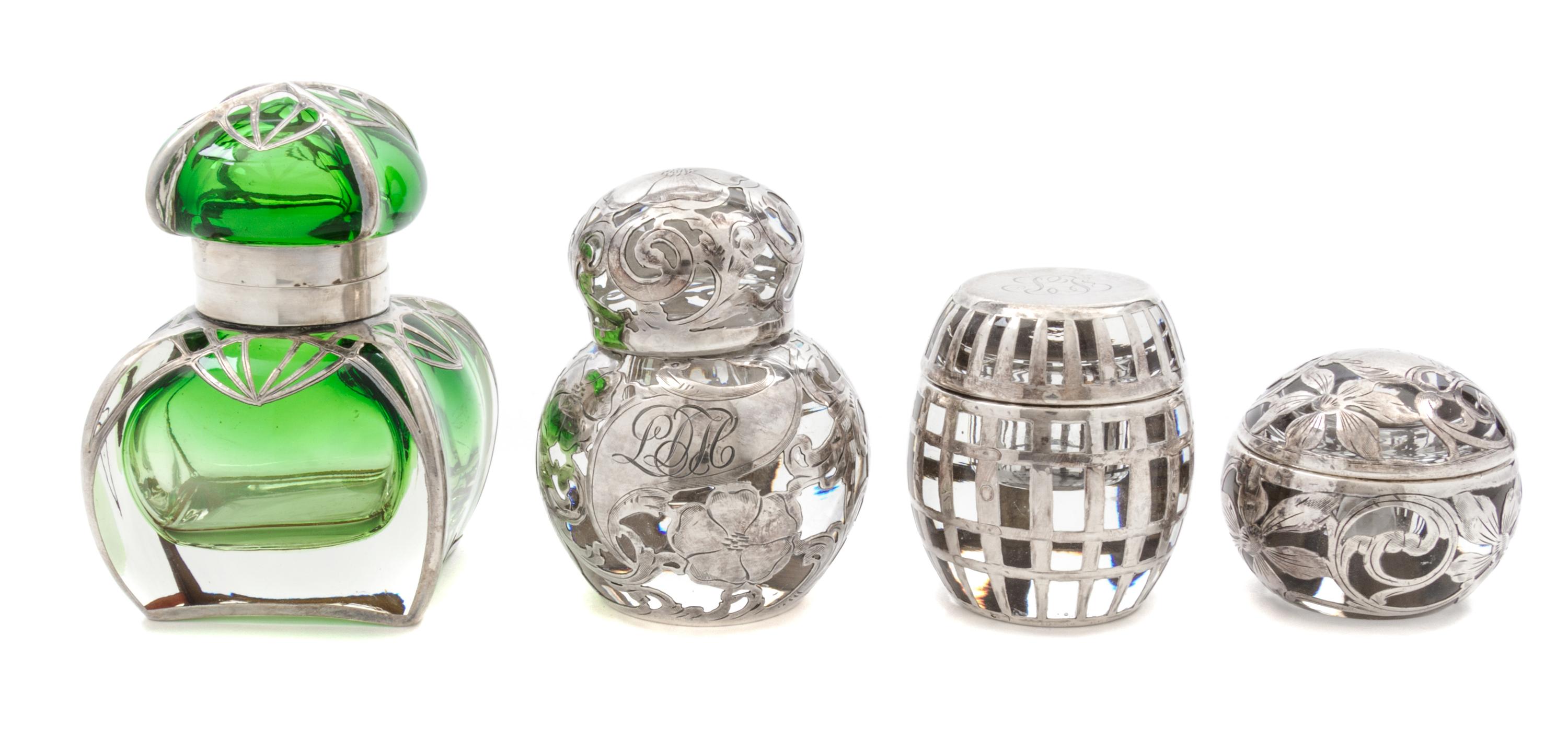 A Group of Four Silver Overlay Glass Ink Wells Height of tallest 4 1/2 inches.