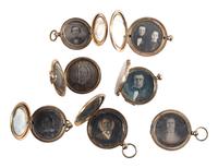 [EARLY PHOTOGRAPHY]. A group of 7 lockets containing 14 daguerreotypes including couples.