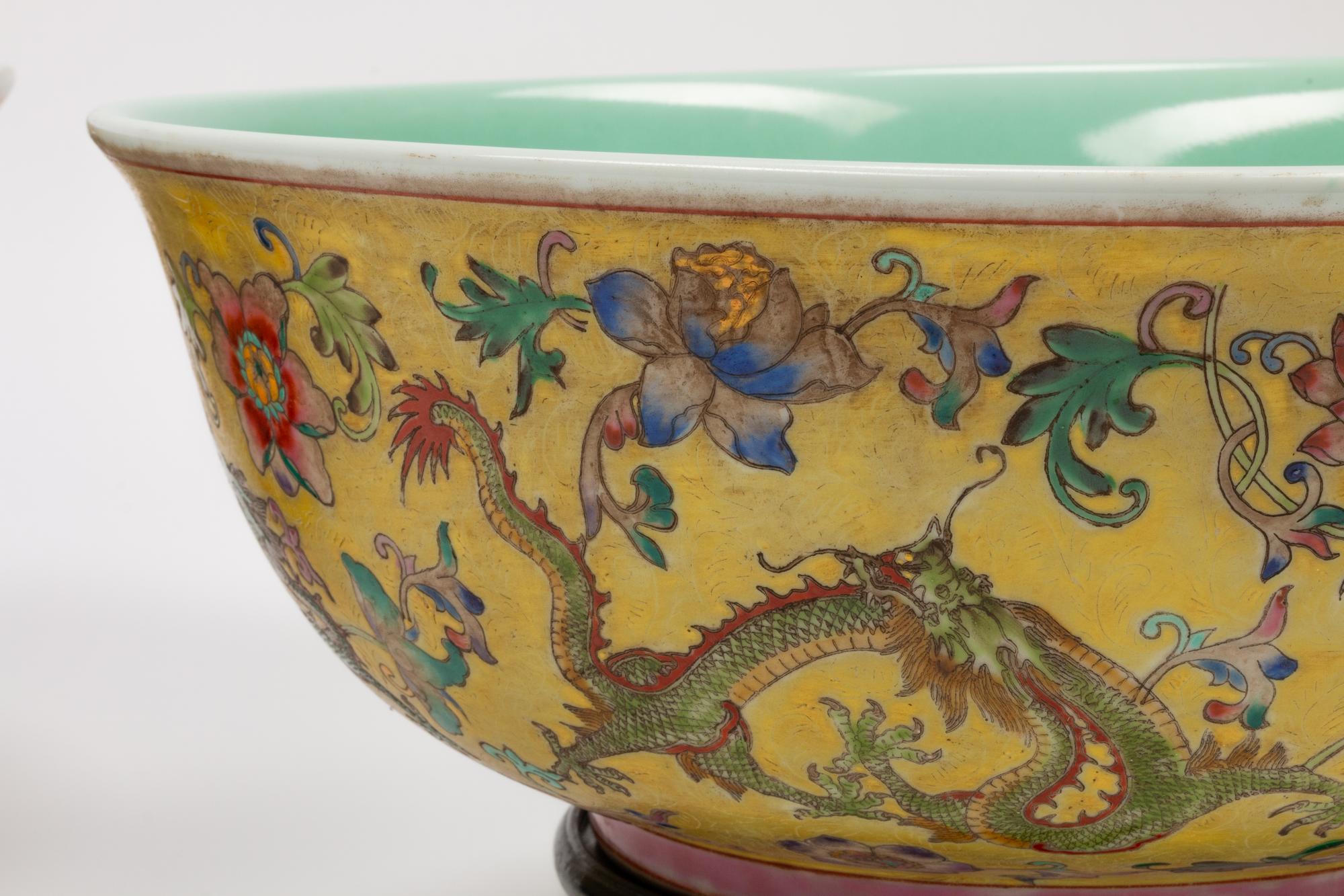 A Pair of Chinese Export Famille Jaune Porcelain Bowls with Wood Bases