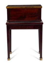 A Directoire Style Mahogany Marble-Top Chest on a Stand