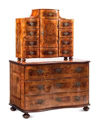 A German or Austrian Walnut and Marquetry Tabernacle Cabinet and Chest of Drawers
