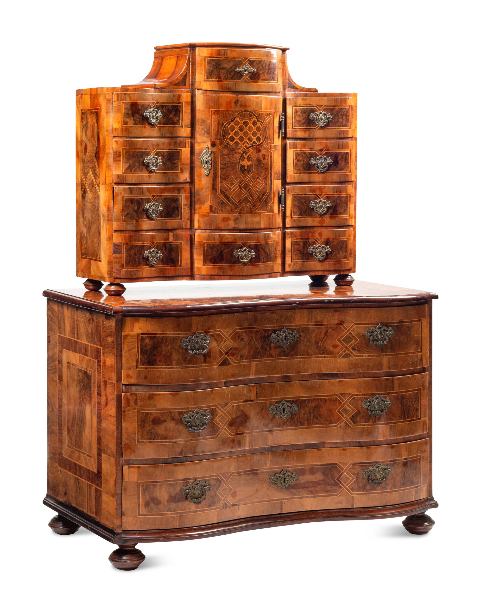 A German or Austrian Walnut and Marquetry Tabernacle Cabinet and Chest of Drawers