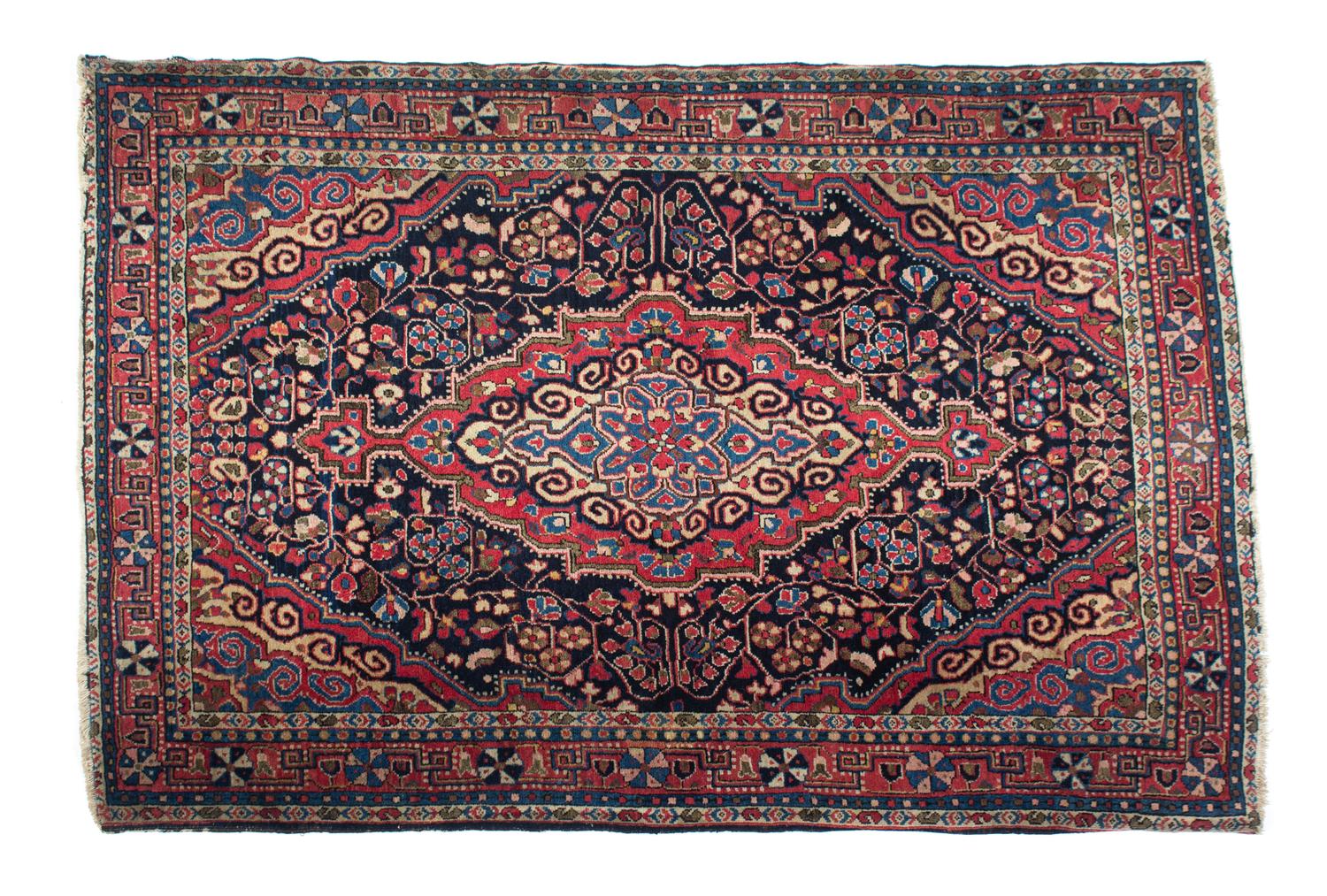 A Persian Wool Rug 57 1/2 x 39 1/2 inches. — 20TH CENTURY