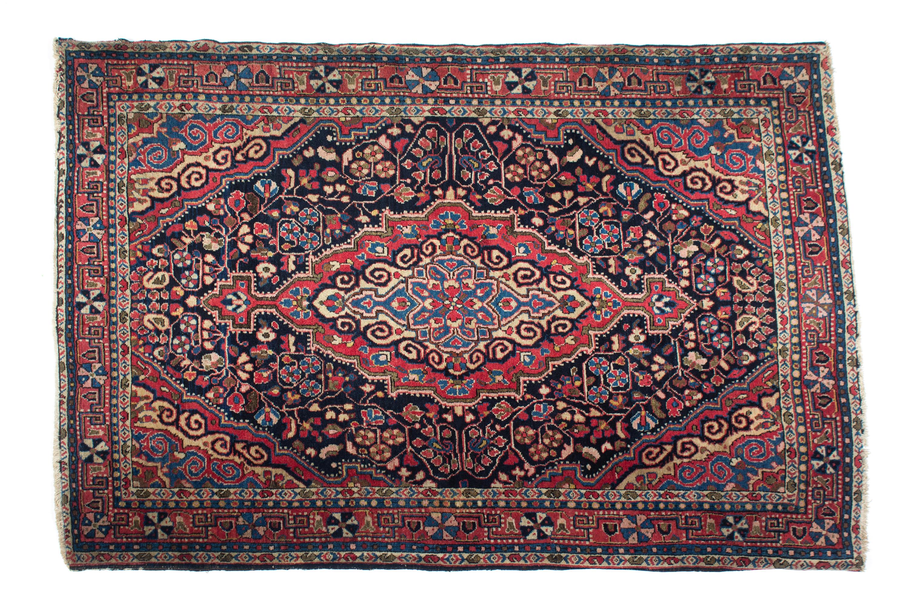 A Persian Wool Rug 57 1/2 x 39 1/2 inches. — 20TH CENTURY