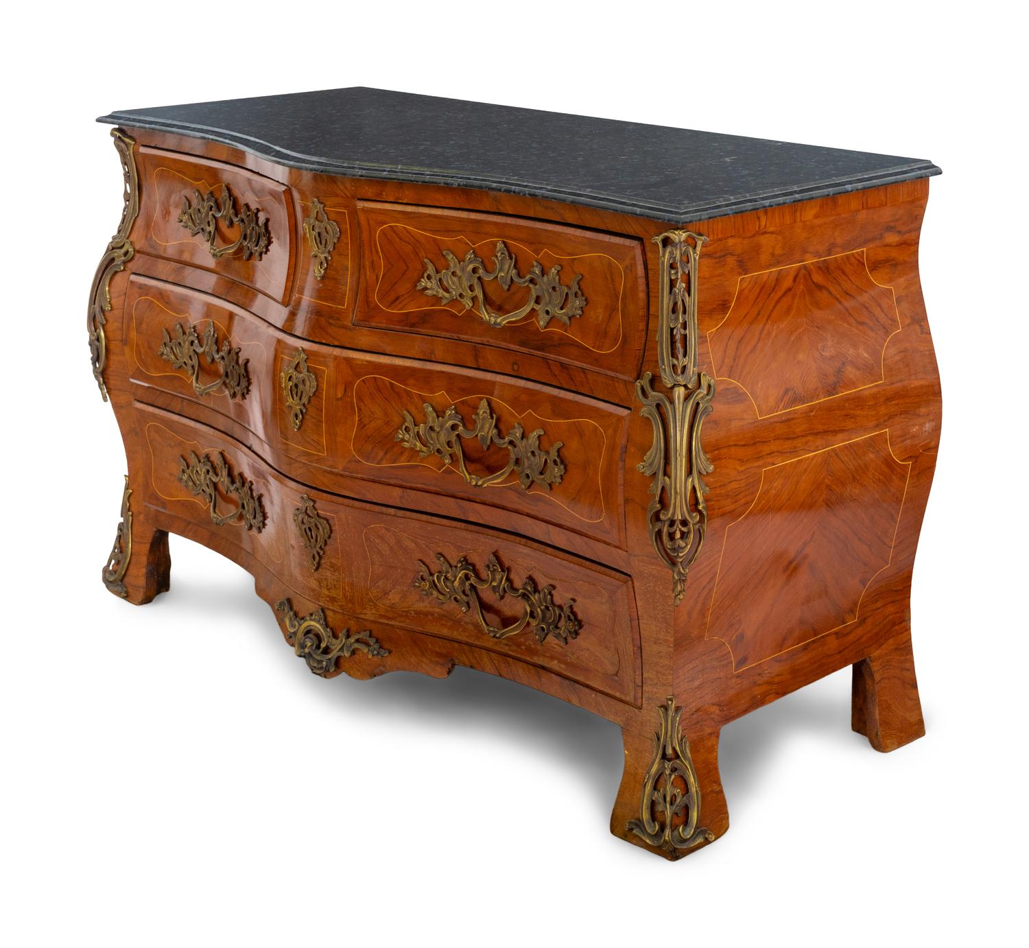 A Régence Style Gilt Metal Mounted Marble-Top Commode