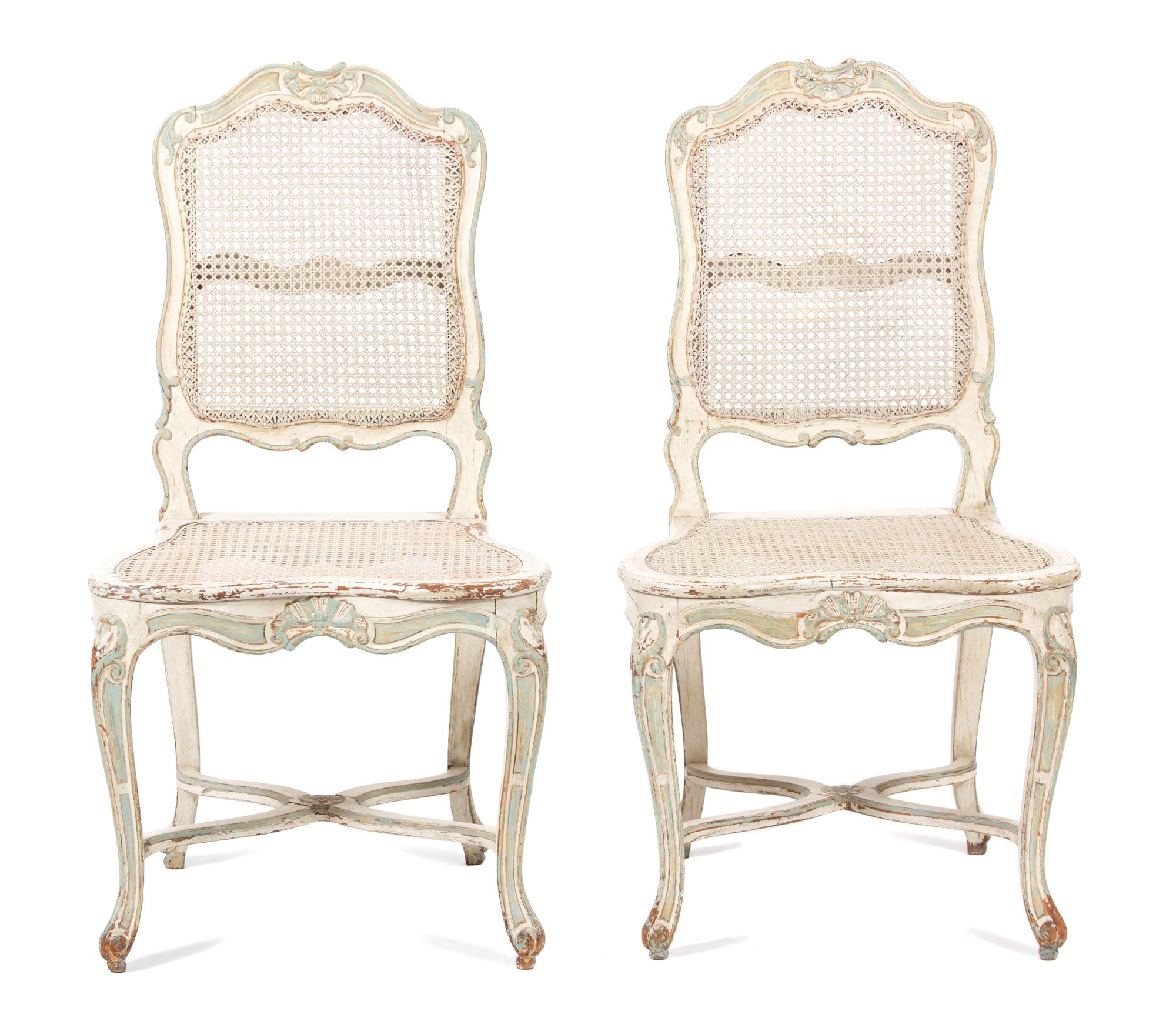 A Pair of Louis XV Style Carved and Painted Caned Back and Seat Side Chairs Height 38 1/2 inches. — 19TH CENTURY