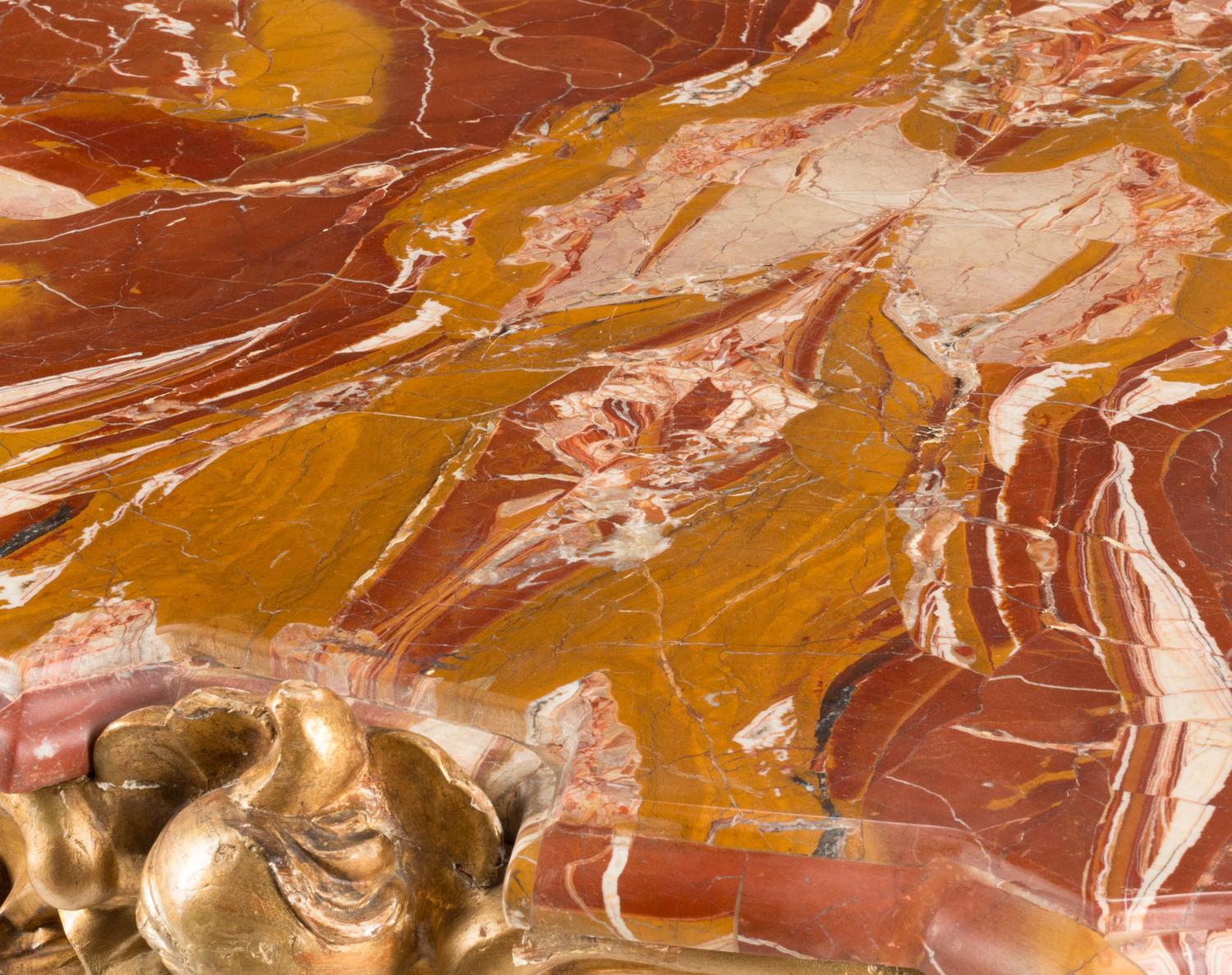 A Venetian Carved Giltwood Marble-Top Console Table