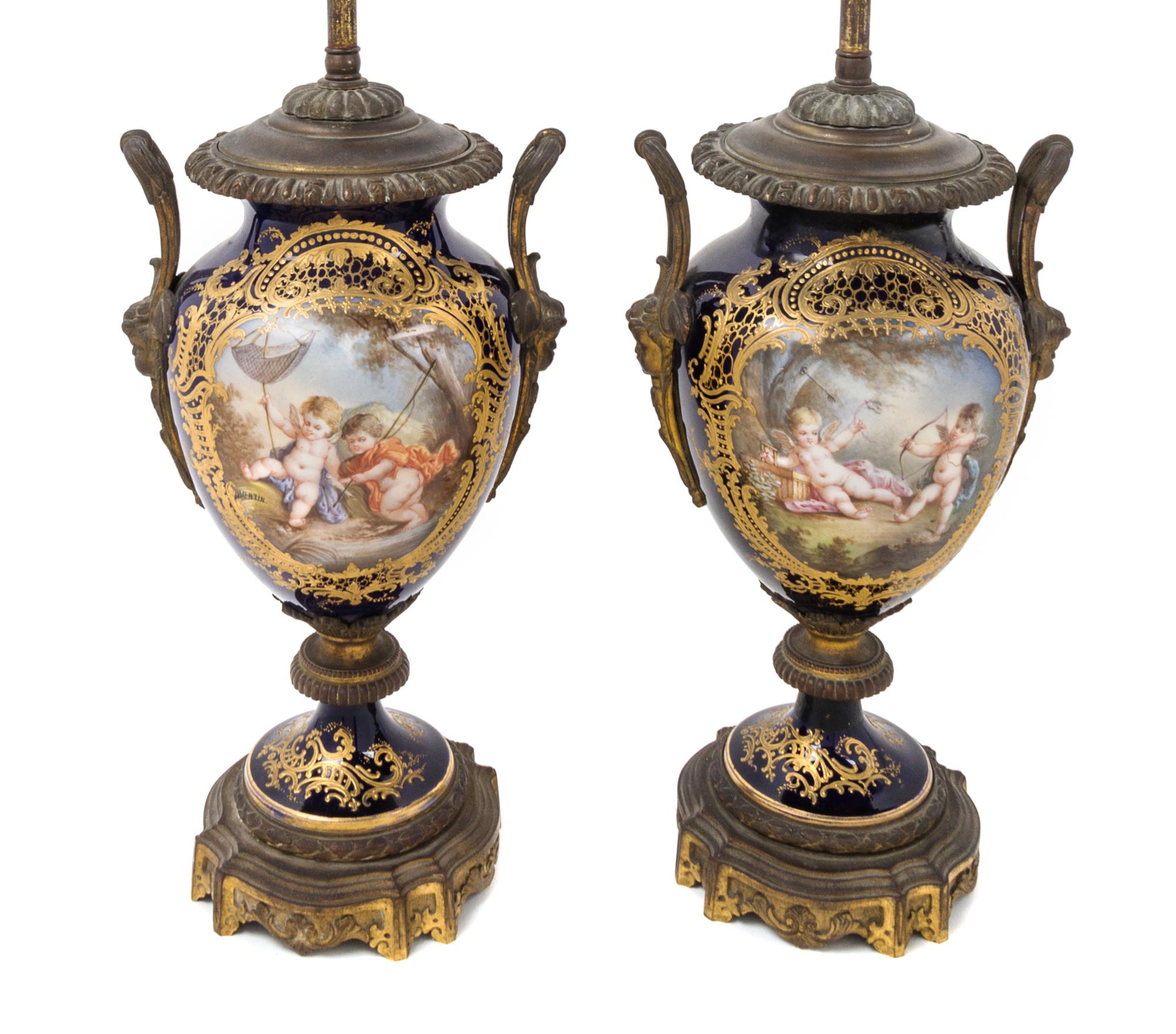 A Pair of Sevres Style Gilt Bronze Mounted Porcelain Vases Height 23 1/2 inches overall.