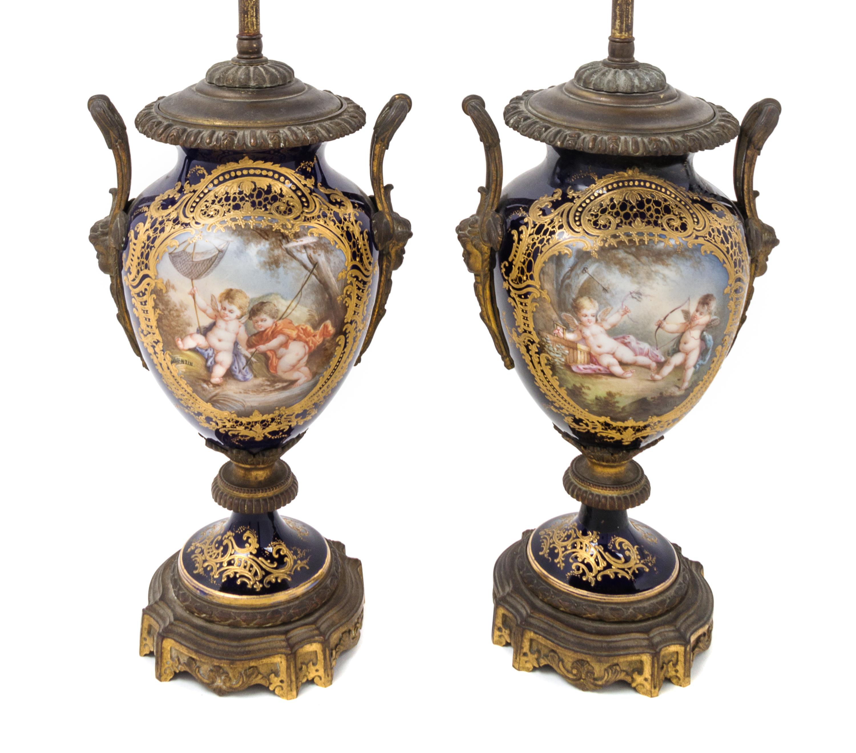 A Pair of Sevres Style Gilt Bronze Mounted Porcelain Vases Height 23 1/2 inches overall.