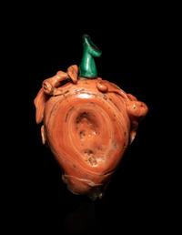 A Carved Red Coral Snuff Bottle
