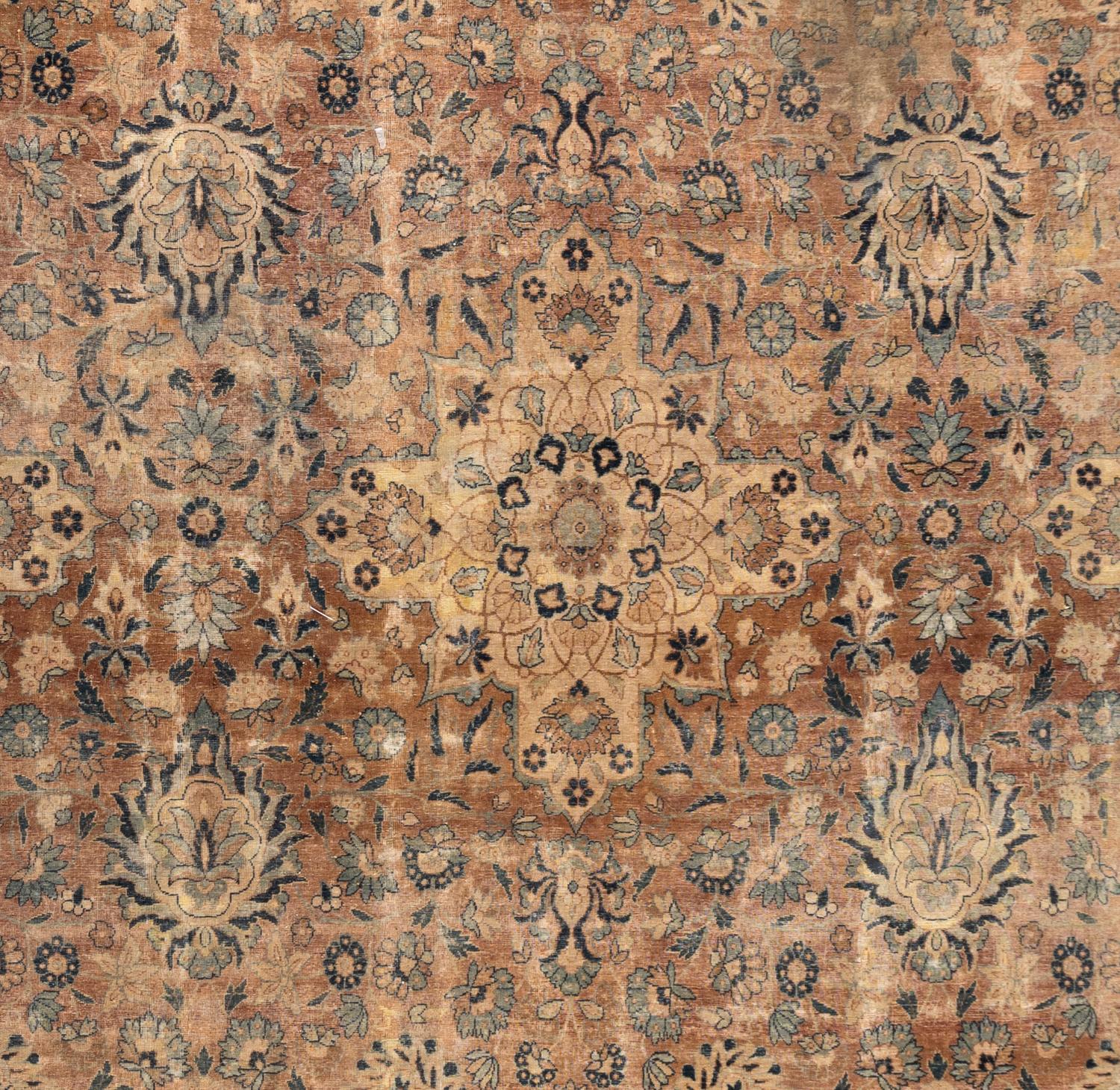 A Kirman Wool Rug