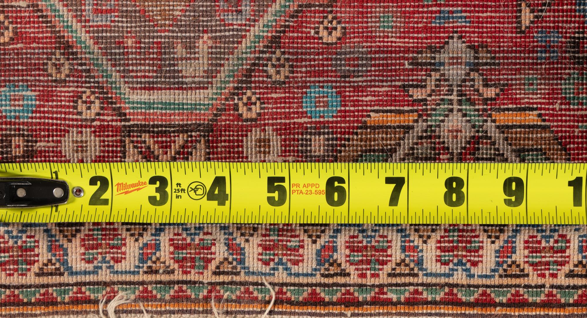 A Group of Three Small Rugs
