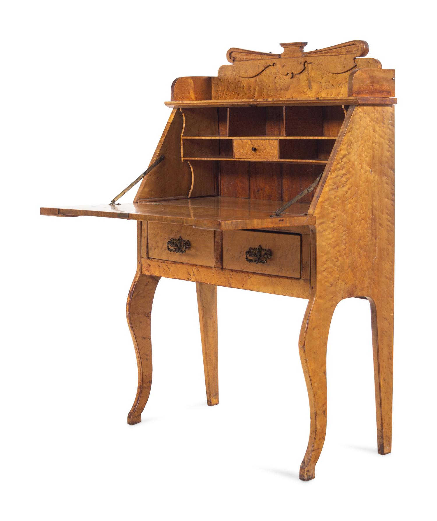 An Austrian Birdseye Maple Slant-Front Desk