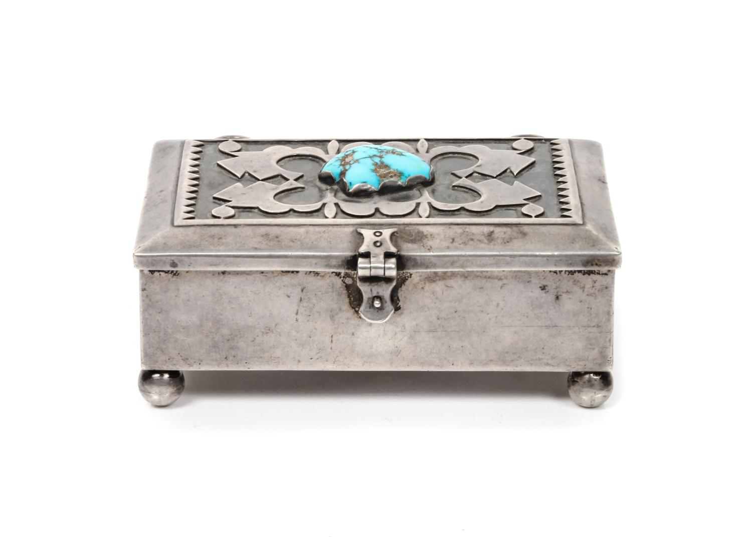 A Navajo Silver and Turquoise Box, Mary Morgan (b. 1923) Height 1 1/4 x width 2 1/2 x length 3 1/2 inches.