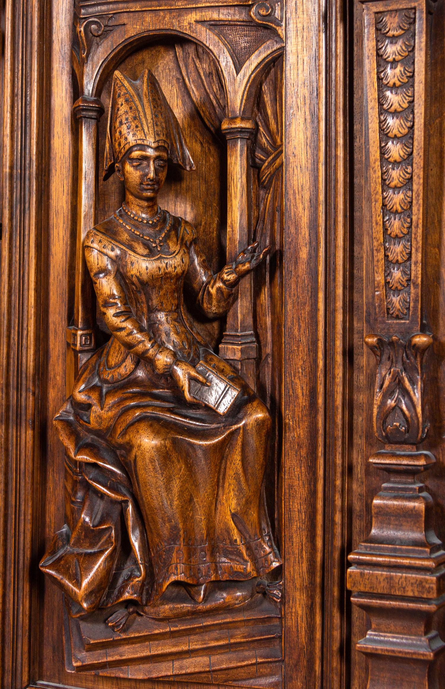 A French Renaissance Revival Carved Walnut Cabinet