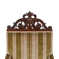 A Pair of Continental Walnut Library Bergères