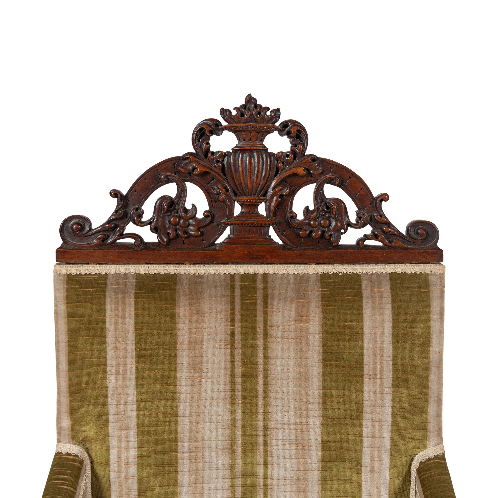 A Pair of Continental Walnut Library Bergères