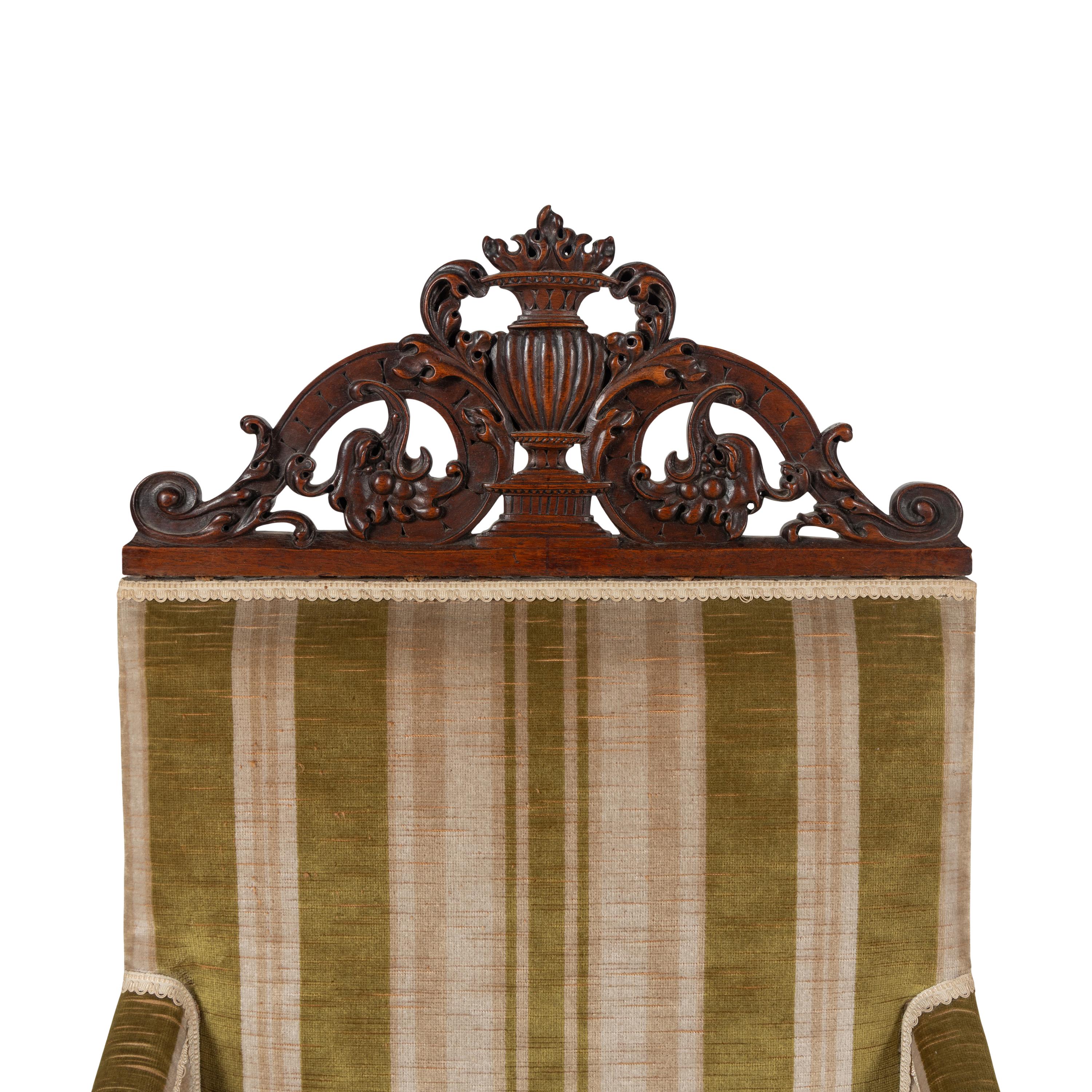 A Pair of Continental Walnut Library Bergères