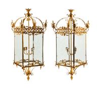A Pair of Louis XVI Style Gilt Bronze and Etched Glass Hall Lanterns
