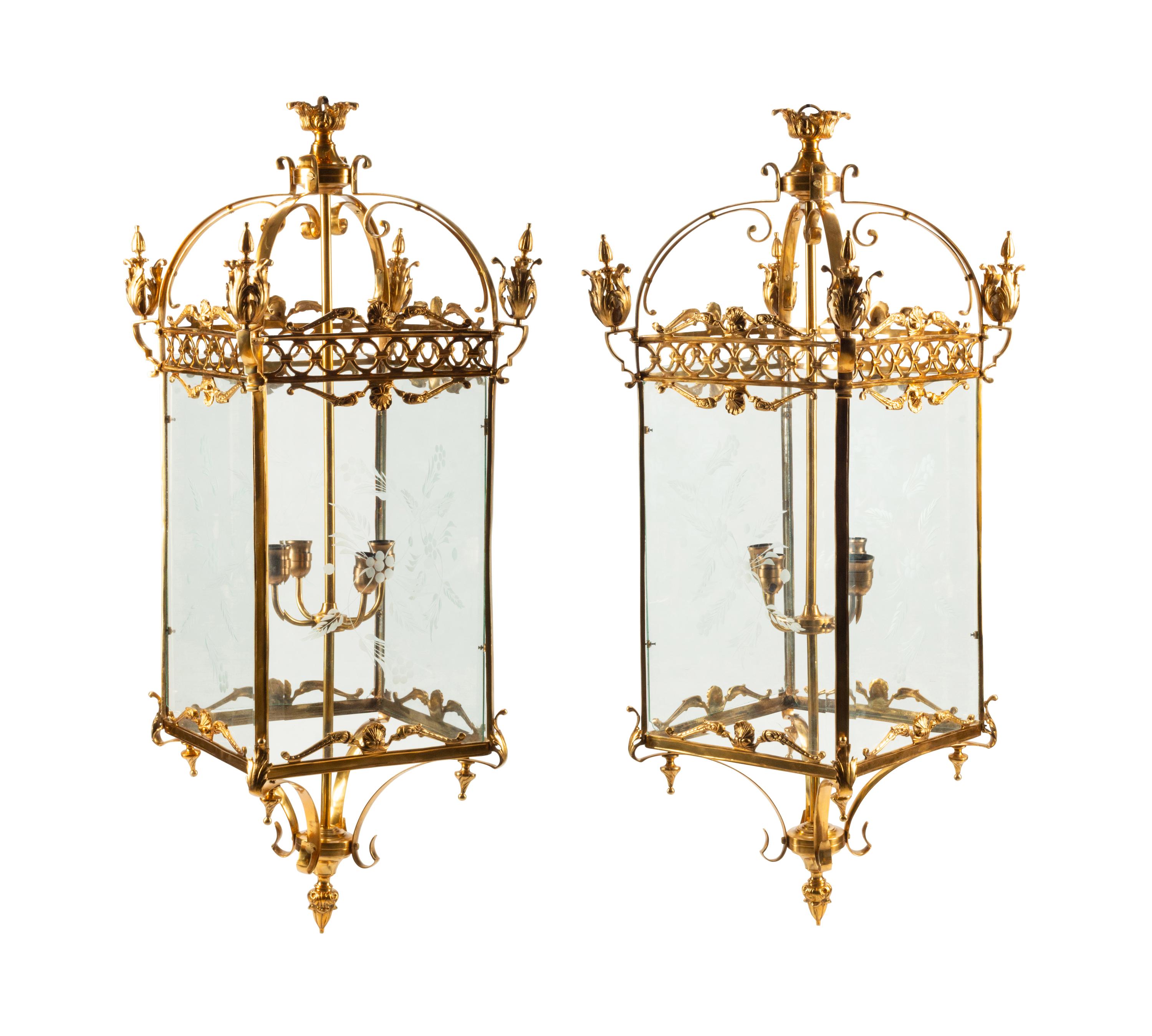 A Pair of Louis XVI Style Gilt Bronze and Etched Glass Hall Lanterns