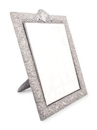 An Edwardian Silver Dresser Mirror
