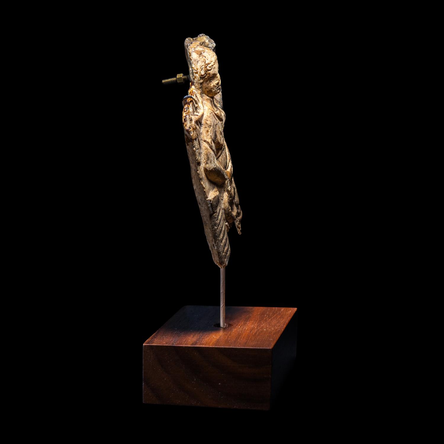 A Roman Bone Fragment with Fortuna