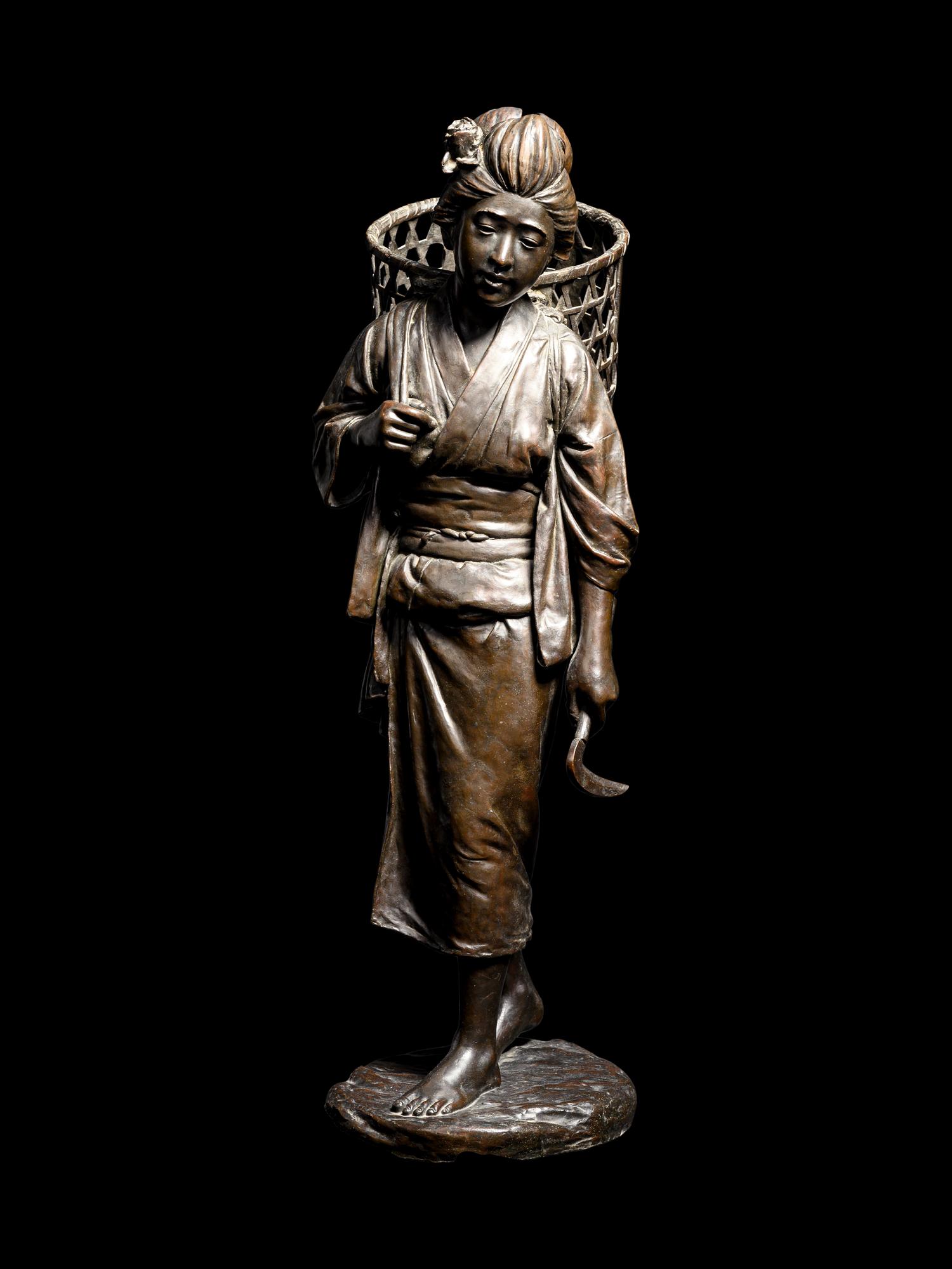 A Bronze Okimono of a Lady
