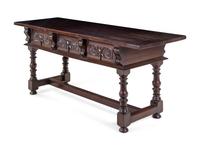 A Spanish or Italian Baroque Style Walnut Sideboard