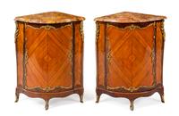 A Pair of Louis XV Gilt Bronze Mounted Palissandre and Tulipwood Encoignures Height 37 x width 28 1/2 x depth 20 inches. — FRANCOIS RUBESTUCK, 18TH CENTURY