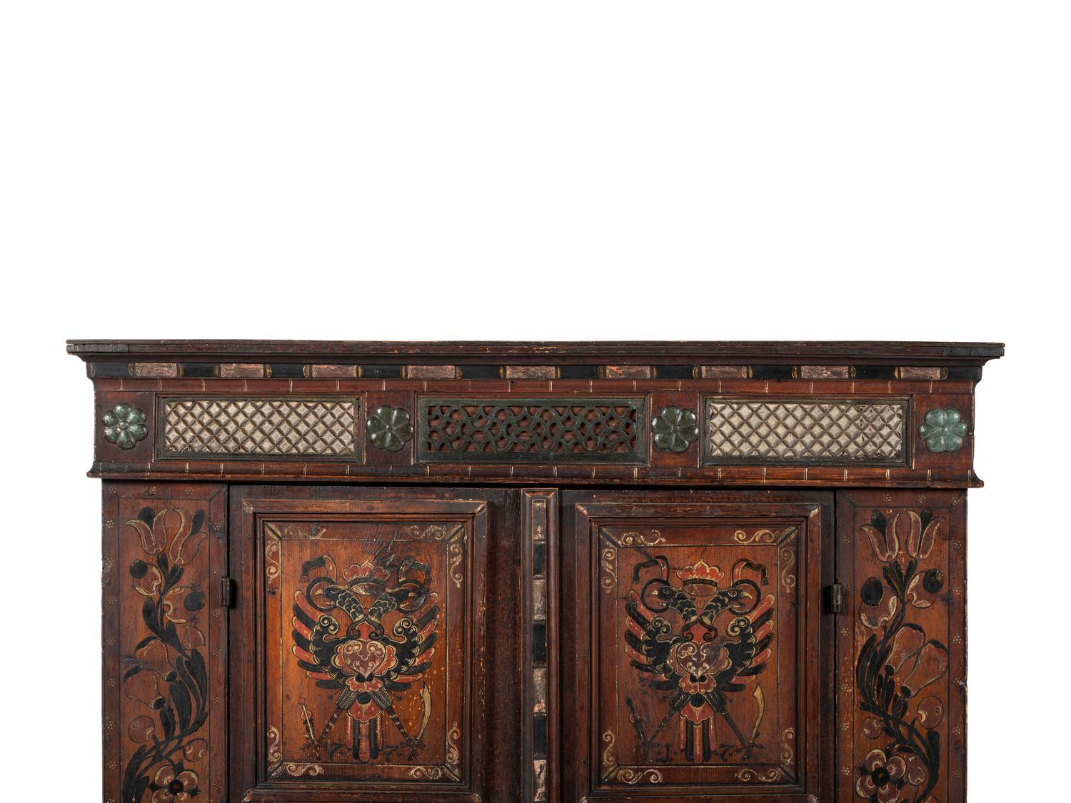 A Continental Carved and Paint Decorated Wardrobe