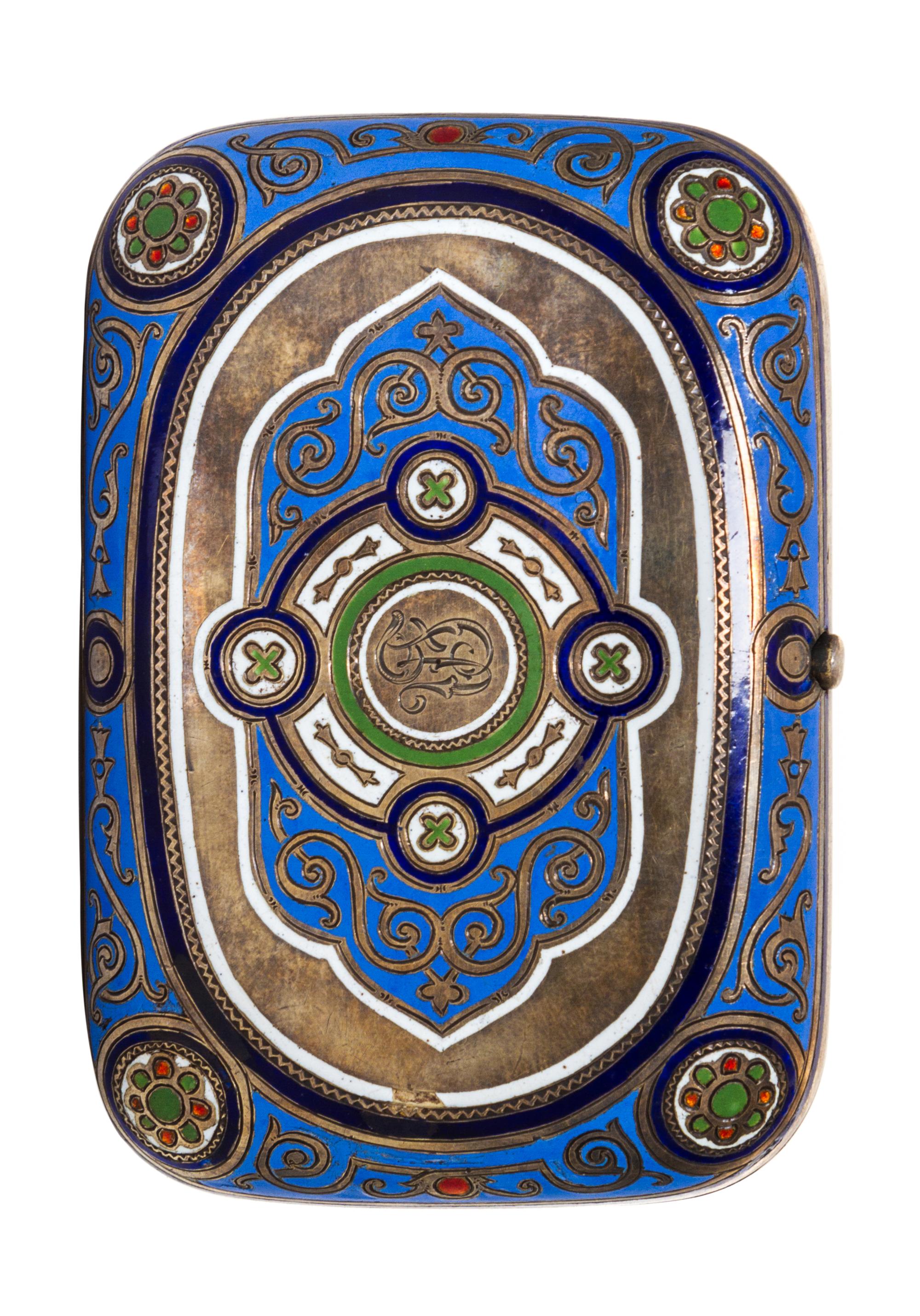 A Russian Enameled Silver Cigarette Case, Michael Ovchinnikov, Moscow, 19th Century, of rectangular form decorated with a troika scene.