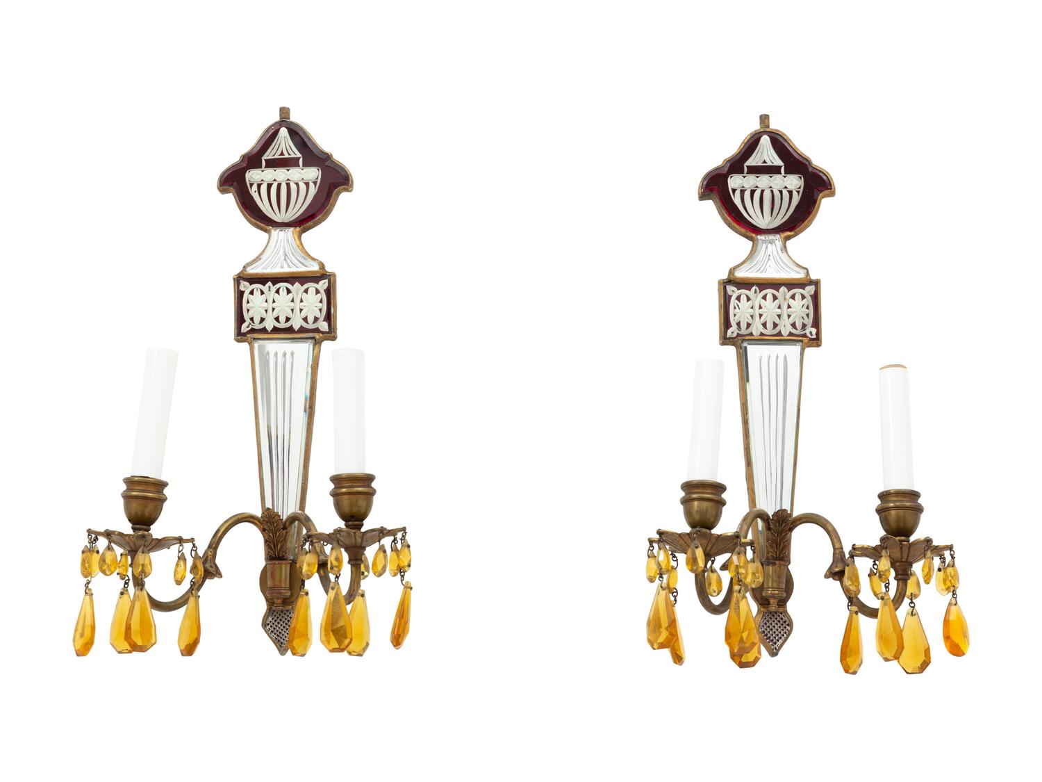 A Set of Four Regency Style Mirrored Two-Light Sconces