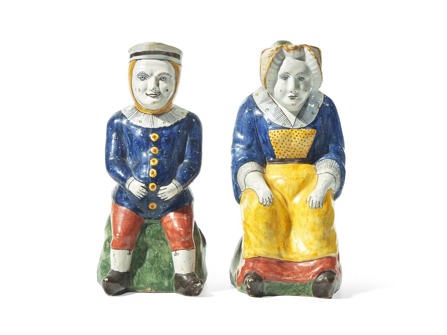 A Pair of Dutch Delft Polychrome Toby Jugs