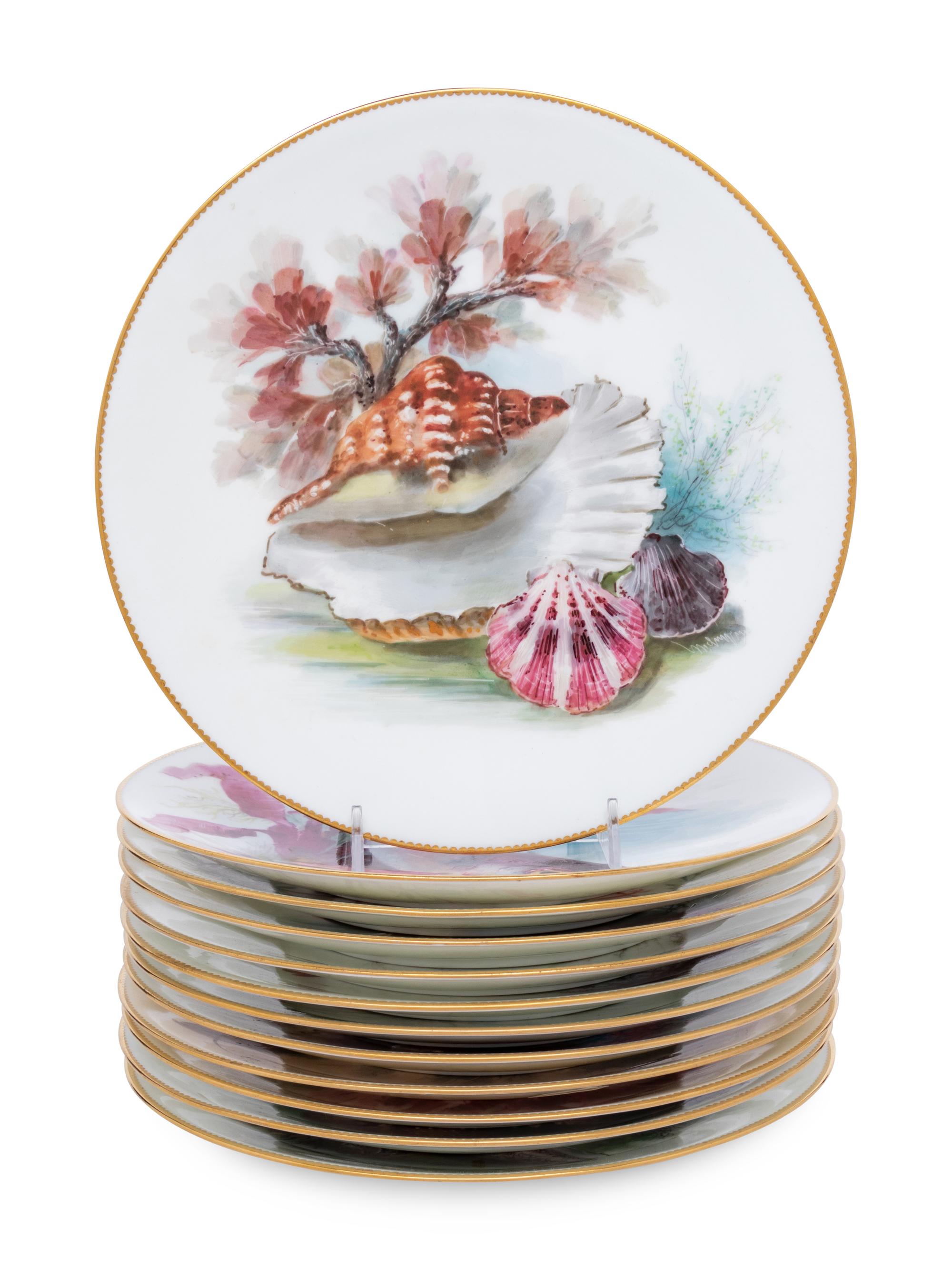 A Set of Twelve Mintons Parcel-Gilt Porcelain Fish and Shell Plates
