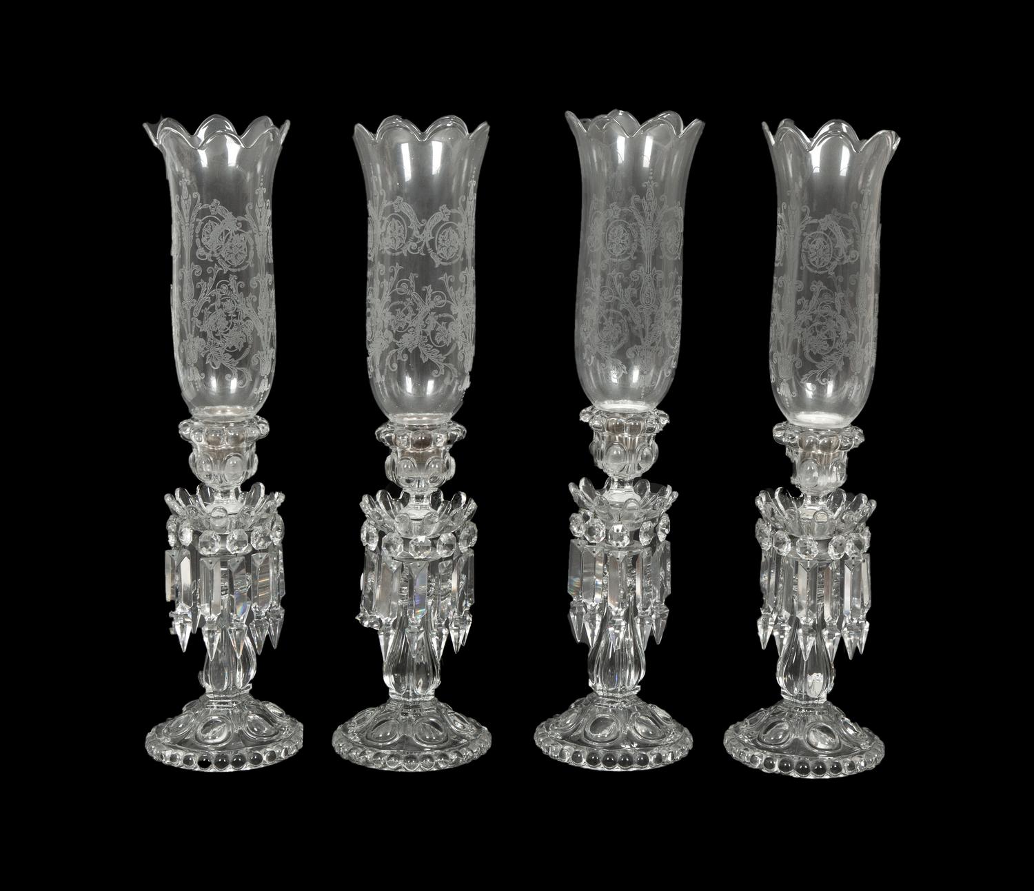 A Set of Four Baccarat Glass Hurricane Lamps