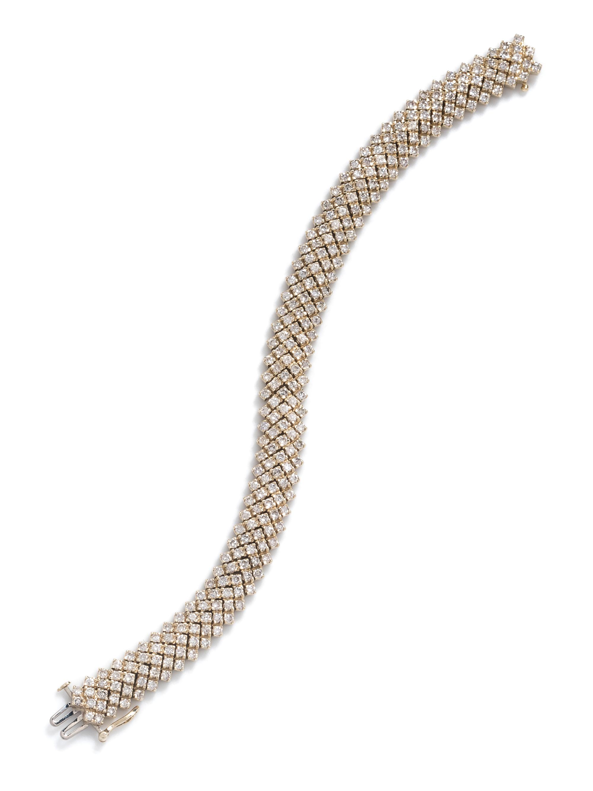 A 14 Karat Yellow Gold and Diamond Bracelet,