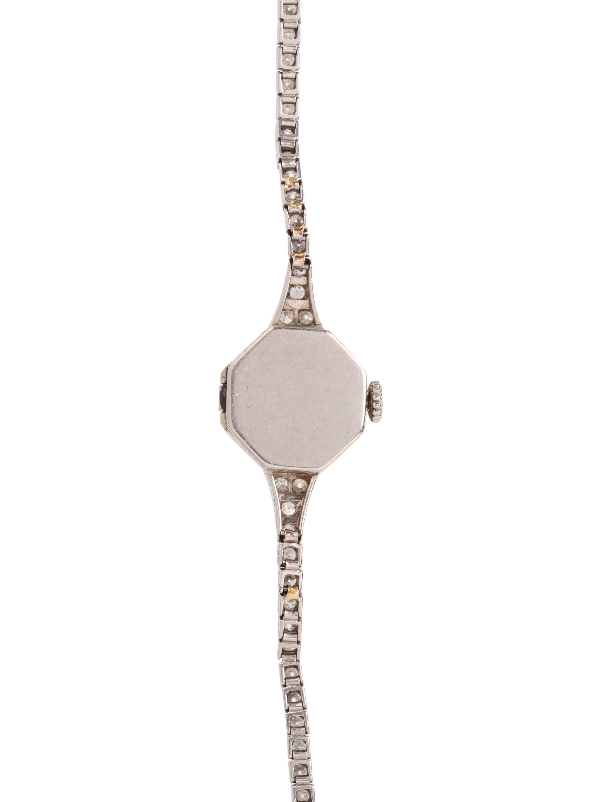 TIFFANY & CO., ANTIQUE, PLATINUM AND DIAMOND WRISTWATCH