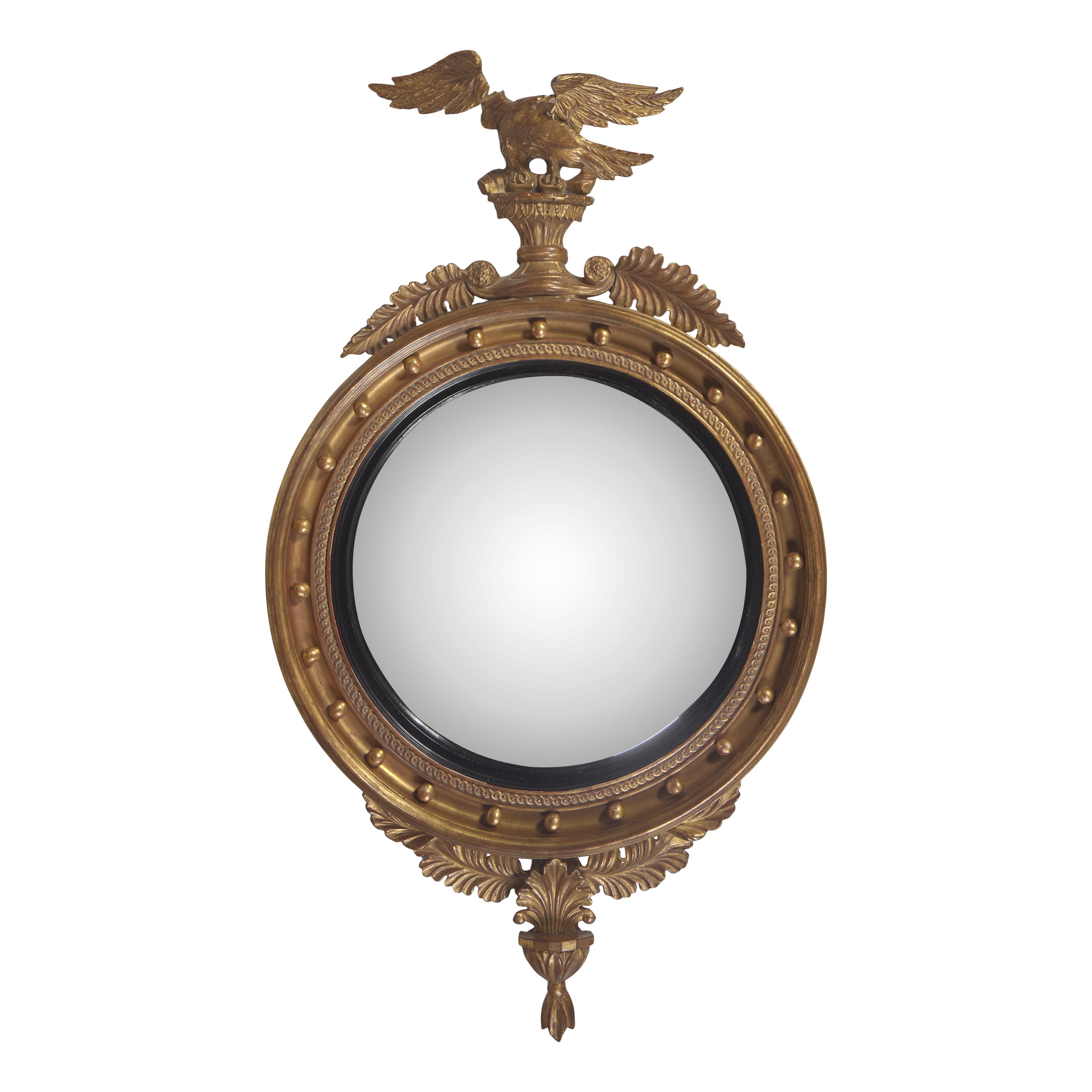 A Regency Style Giltwood Bull's Eye Looking Glass