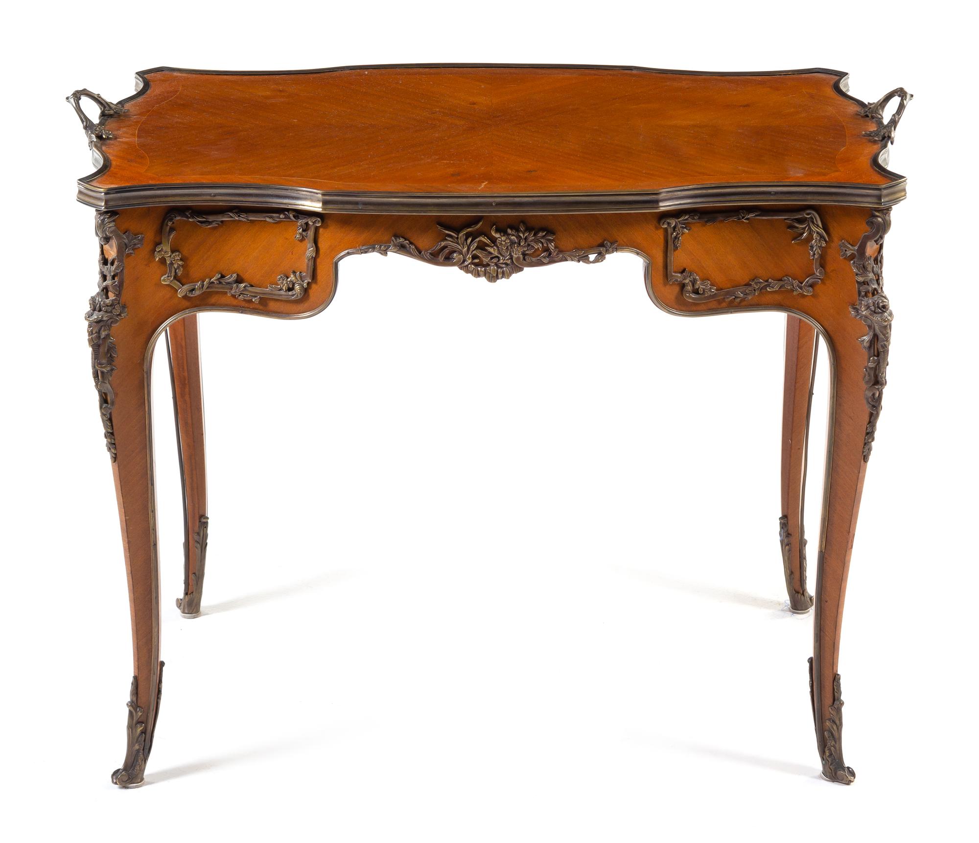 A Louis XV Style Gilt Bronze Mounted Tea Table Height 27 3/8 x width 36 1/2 x depth 23 inches. — 20TH CENTURY