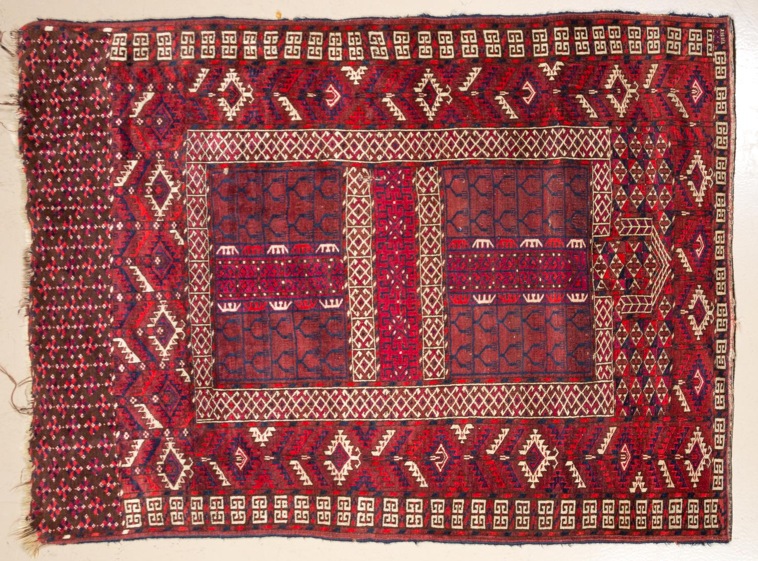 A Northwest Persian Wool Rug 5 feet 4 inches x 4 feet 1 1/2 inches.