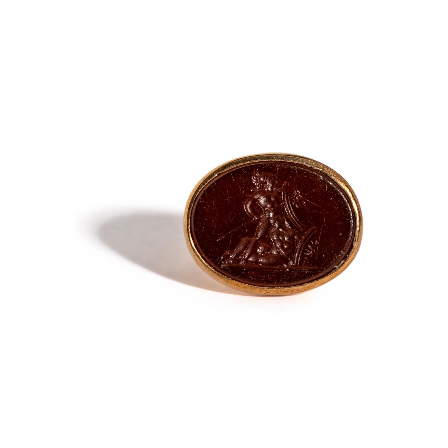 A Neoclassical Red Jasper and Gold Finger Ring with Two Hoplites