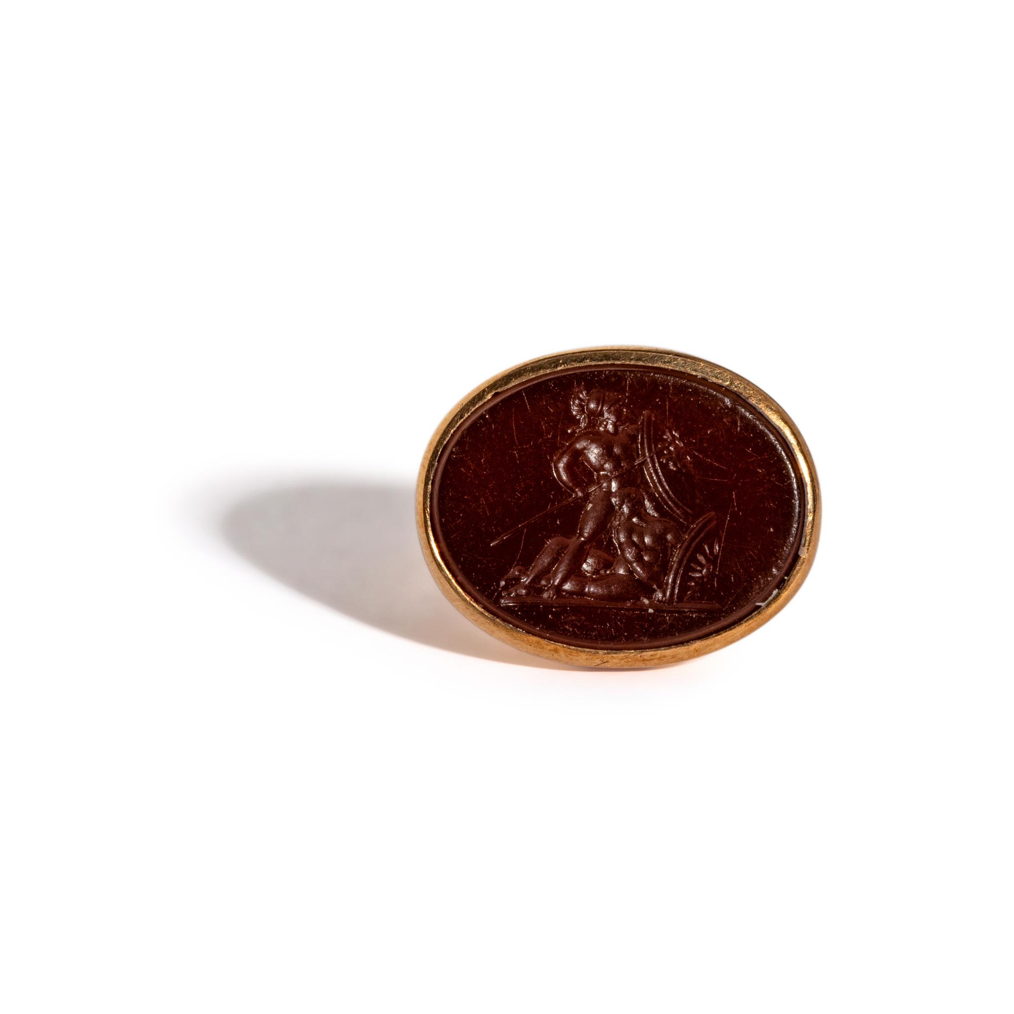 A Neoclassical Red Jasper and Gold Finger Ring with Two Hoplites