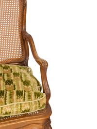 A Pair of Louis XV Style Caned Beechwood Fauteuils