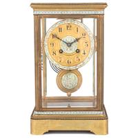 A Japy Freres Gilt Bronze and Champleve Clock