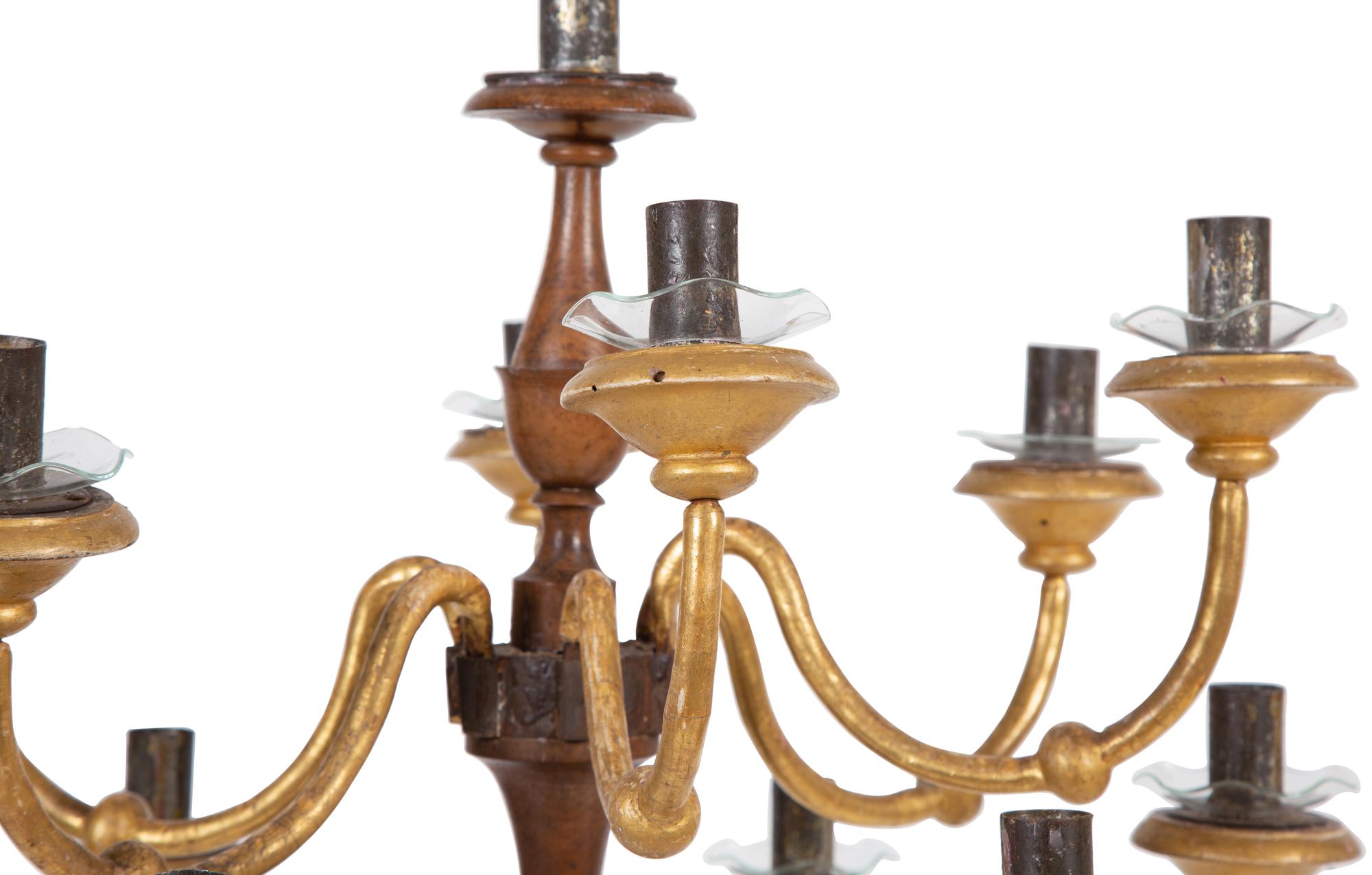An Italian Parcel-Gilt Carved Fruitwood Thirteen-Light Candelabrum