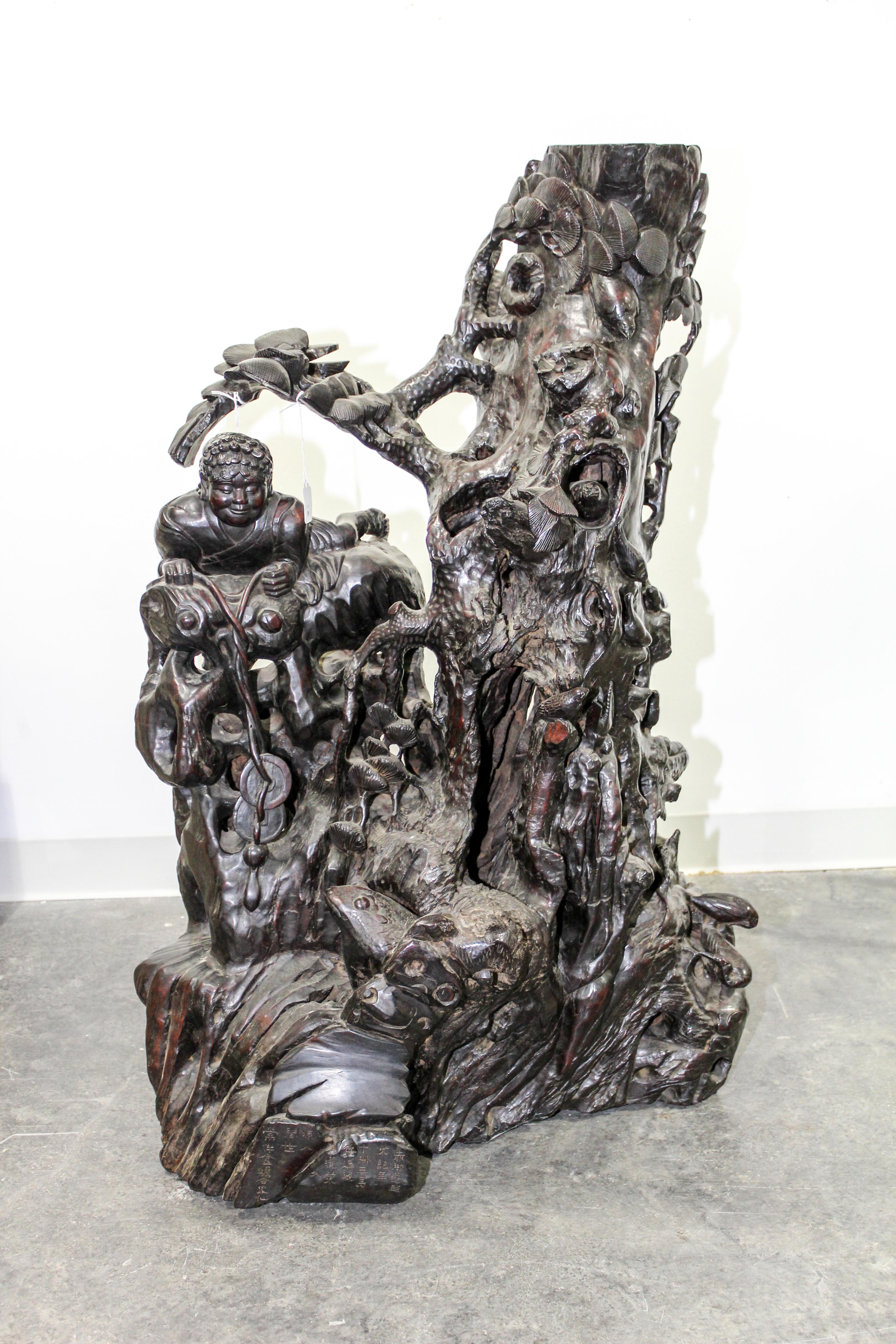 A Japanese Carved Wood Figural Group Height 41 inches.